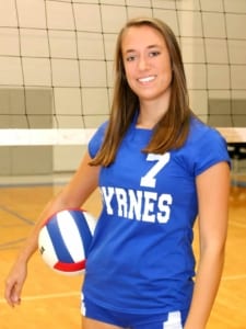 Female volleyball player with a bright smile. 