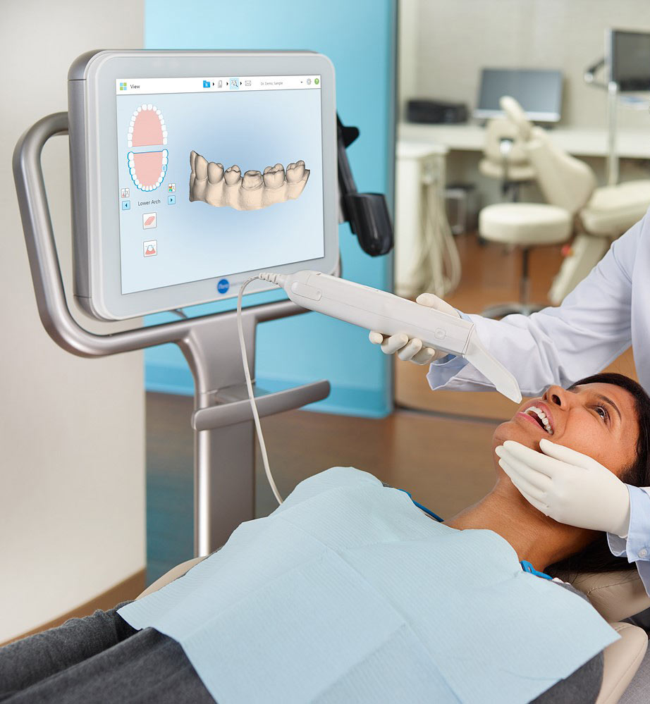 A woman experiencing the itero technology at an orthodontic practice.