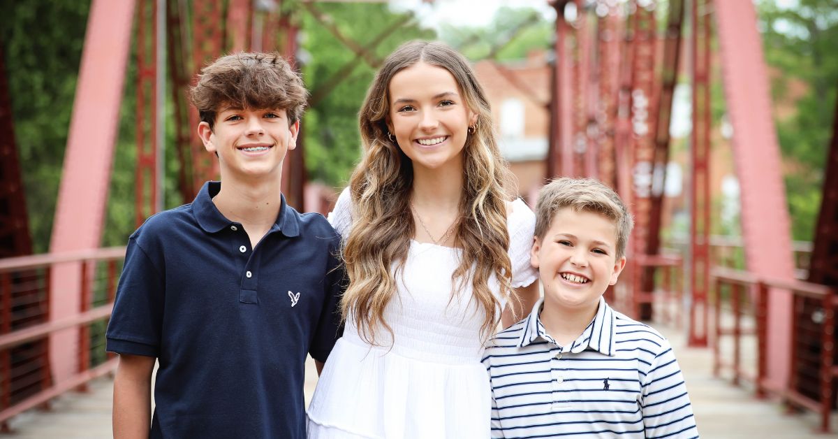 siblings take a pic together after getting invisalign in spartanburg