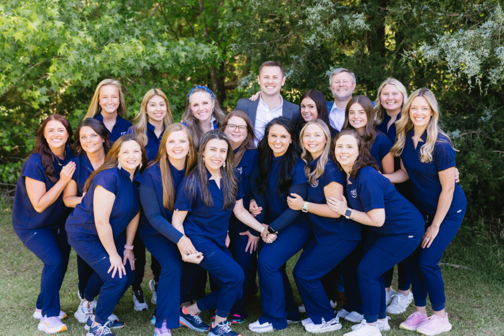Nth Degree Orthodontics team all together, smiling, you don't need orthodontist referral to see orthodontist in Woodruff, SC