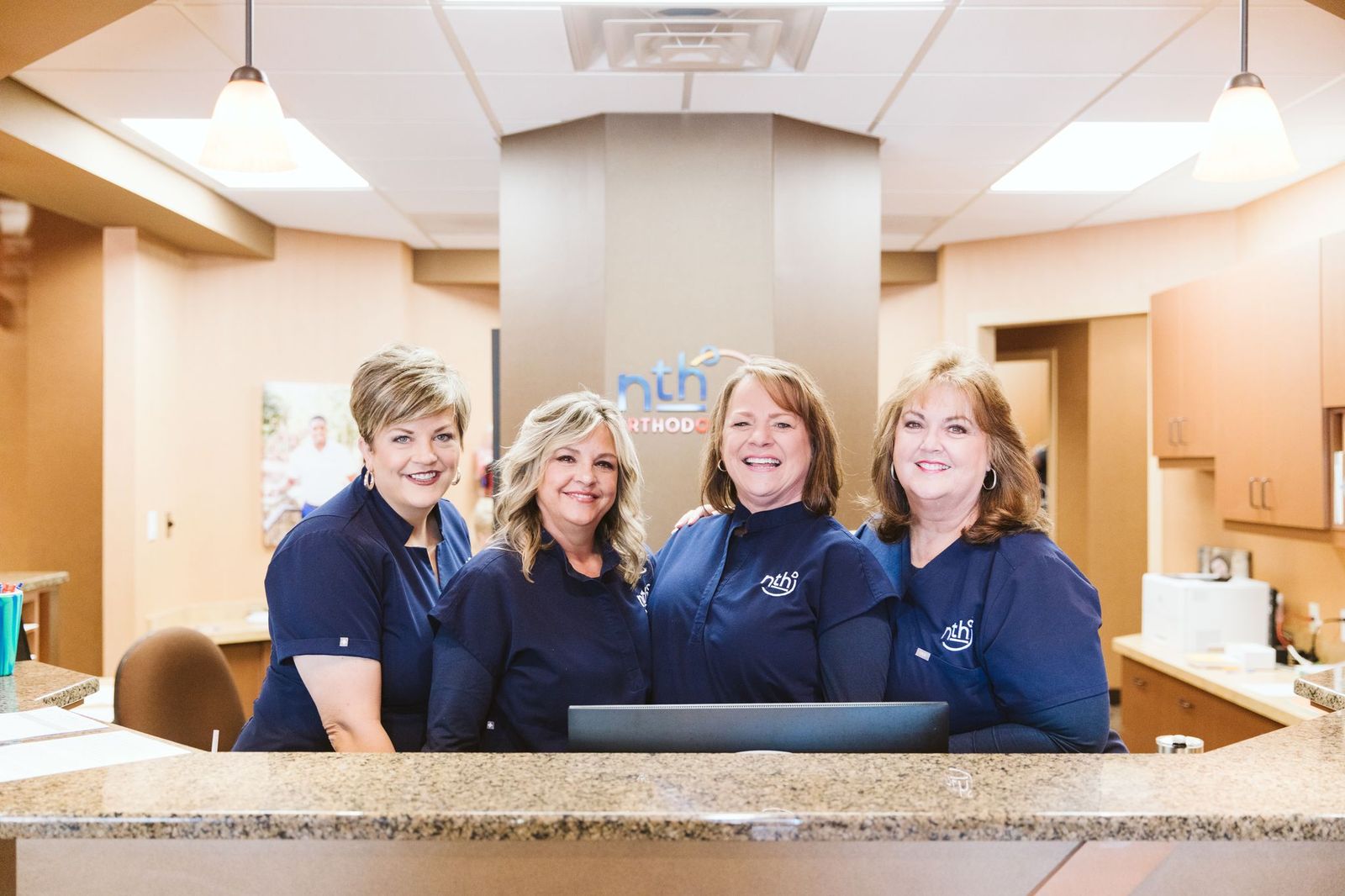 team smiles at should I get a second opinion before choosing an orthodontist?