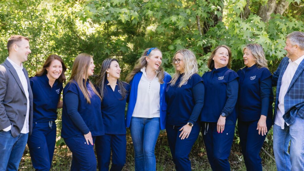 Nth Degree Orthodontics team smiling, signs of orthodontic treatment and healthy smiles in Spartanburg, SC.