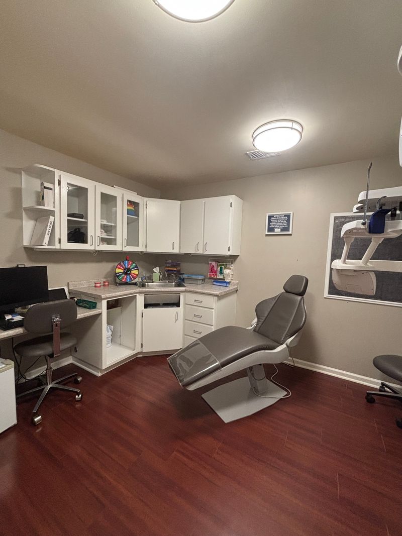 Nth Degree Orthodontics Union office waiting area with dental chair and cabinetry.
