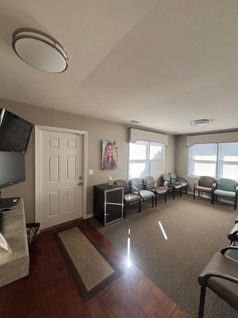 Nth Degree Orthodontics Union office waiting area with comfortable seating and patient portrait.